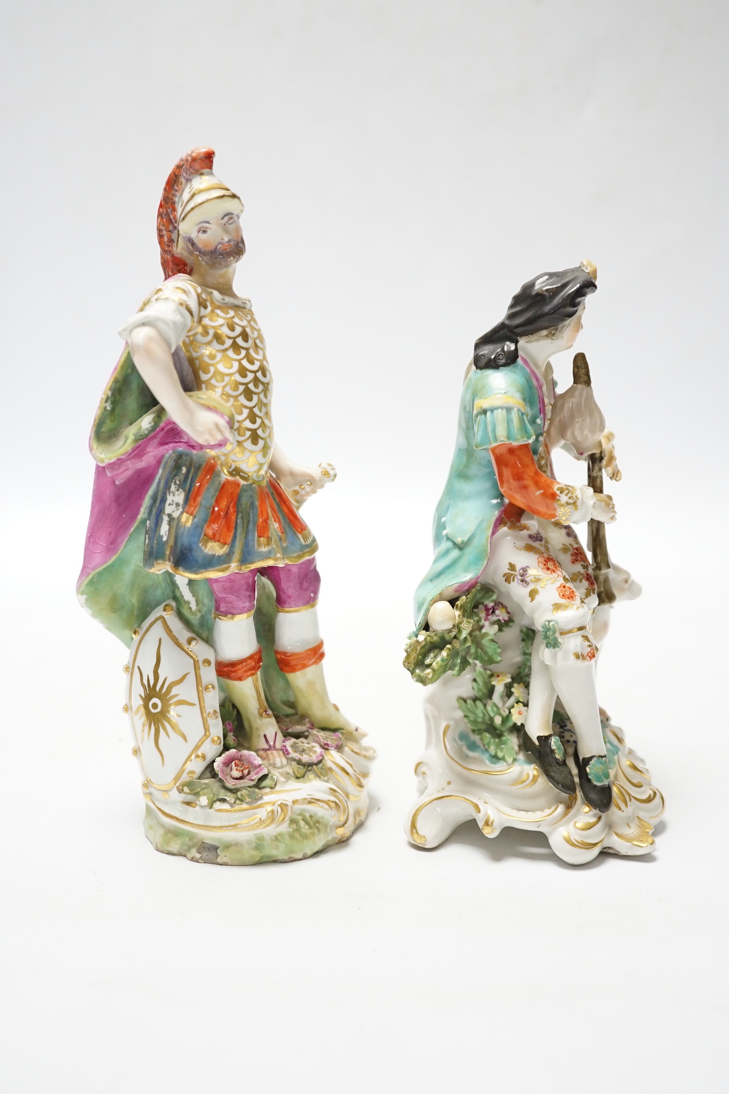 A Chelsea Gold Anchor figure of Mars, c.1760-5, and a Derby figure of a bagpiper, c.1765-70, 20cm (2)